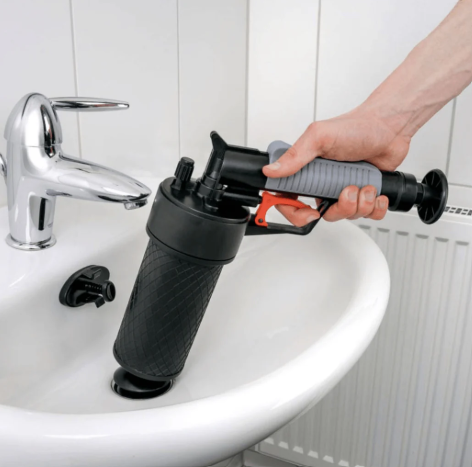 Pump action drain unblocker